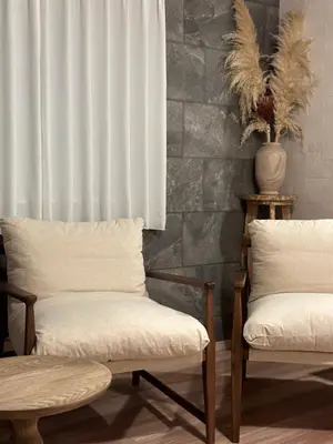 a room with two chairs and a curtain at Wasabi Box House - Ikebukuro Area in Tokyo