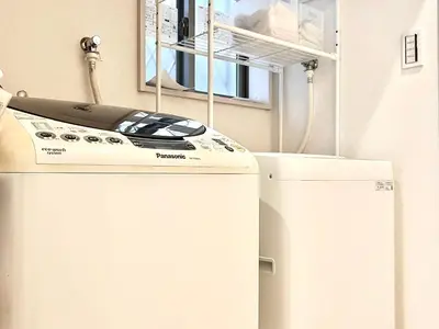 a iron is sitting on top of a refrigerator at Nerima house NR0250 in Tokyo