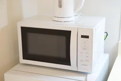a white microwave with a blender on top of it at Palais Grace Room 301 - Vacation STAY 56621v in Tokyo