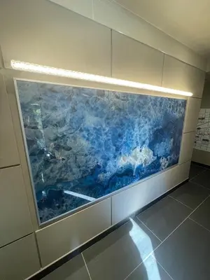 a large fish tank on a wall in a room at The Masters Stay Room 302 - Vacation STAY 06093v in Tokyo