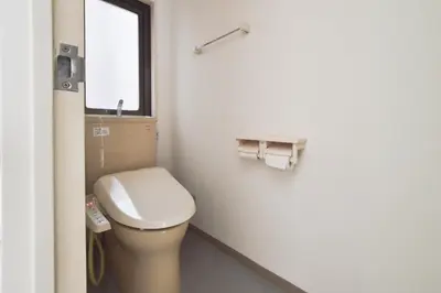 a bathroom with a toilet and a window at Prinets Shinjuku Building - Vacation STAY 17728 in Tokyo
