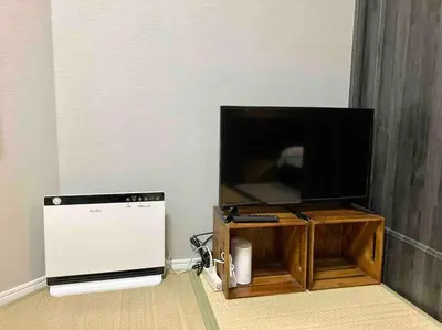 a television and a dishwasher in a room at yuga hotel tokiwadai in Tokyo