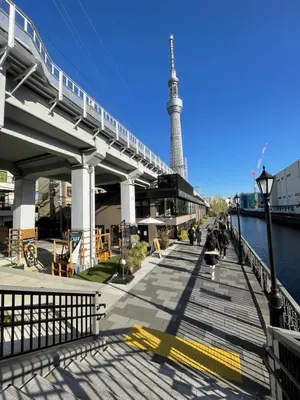 a bridge with the eiffel tower in the background at \u30b9\u30ab\u30a4\u30c4\u30ea\u30fc\u30d0\u30b1\u30fc\u30b7\u30e7\u30f3 in Tokyo