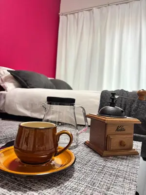 a coffee cup on a plate on a table at \u30b9\u30ab\u30a4\u30c4\u30ea\u30fc\u30d0\u30b1\u30fc\u30b7\u30e7\u30f3 in Tokyo