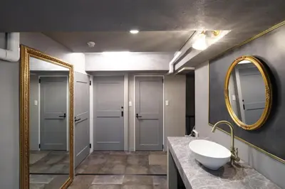 a bathroom with a sink and a mirror at Spacious 80sqm Apt near Shibuya Crossing, 8 min walk to Shibuya Station in Tokyo