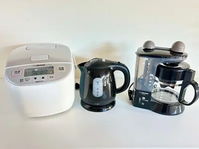 a toaster and a coffee maker on a counter at Second Home KANAMECHO in Tokyo