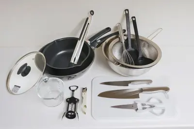 a group of utensils sitting on top of a counter at Second Home KANAMECHO in Tokyo