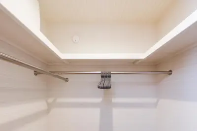 a ceiling in a room with a broom at Second Home KANAMECHO in Tokyo