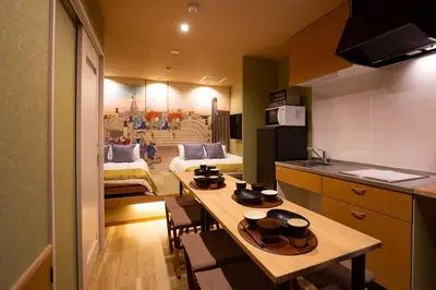 a kitchen with a table with bowls on top of it at unito \u9752\u7825 in Tokyo