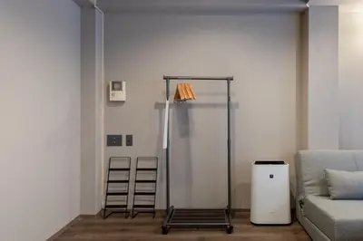 a living room with a glass shower stall and a couch at \u30b0\u30e9\u30b9\u30ad\u30e3\u30d3\u30f3\u6d5c\u677e\u753aaw Second and third floors in Tokyo