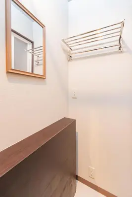 a mirror on a wall in a room at \u6d45\u8349\u30a2\u30d1\u30fc\u30c8\u30e1\u30f3\u30c8 401 in Tokyo