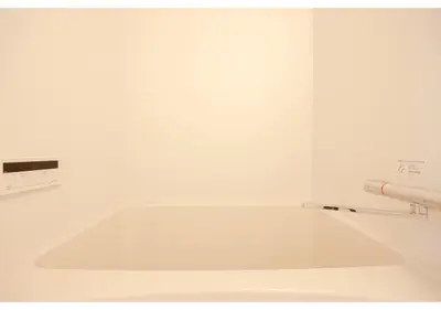 a white bath tub in a white bathroom at Lido Blu in Tokyo