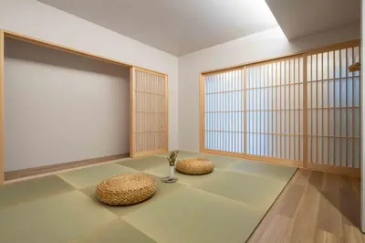 a room with two stools and a large window at KUTSUROGI SAUNA and STAY in Tokyo