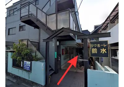 a building with a staircase in front of a building at \u6c60\u888b\u99c5\u307e\u3067\u96fb\u8eca\u30677\u5206 4LDK98m2 in Tokyo