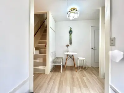 a small apartment with a staircase and a table at \u6771\u5927\u5c9b\u7ad9\u5f92\u6b656mins-KT0311 in Tokyo