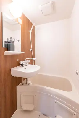 a bathroom with a sink and a bath tub at \u6d45\u8349\u30a2\u30d1\u30fc\u30c8\u30e1\u30f3\u30c8301 in Tokyo