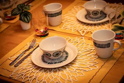 a table with three cups and plates on a table at \u677e\u304c\u8c37\u30a2\u30d1\u30fc\u30c8\u30e1\u30f3\u30c8301 in Tokyo