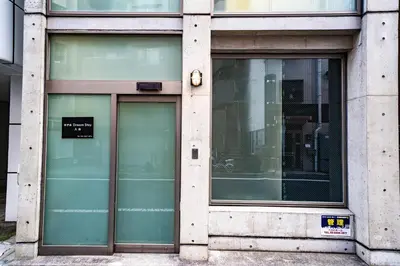 a store front window with a sign on it at \u677e\u304c\u8c37\u30a2\u30d1\u30fc\u30c8\u30e1\u30f3\u30c8301 in Tokyo