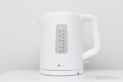 a white appliance sitting on top of a counter at Prim Square, 8min walk to Shibuya Sta in Tokyo