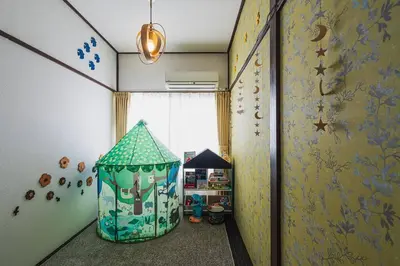 a hallway with a room with a toy house on the wall at House YOYOGI Park, Shibuya Area, 4 Minutes to Yoyogi Park, 4-Bedroom, Sleeps 8 in Tokyo