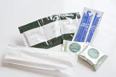 a group of products sitting on a white table at Business Hotel Yamashiro in Tokyo