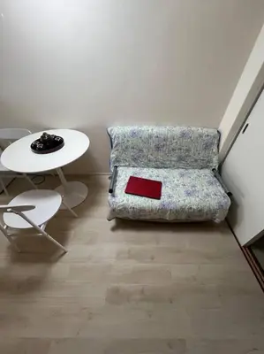 a living room with a couch and a table at shinjyuku area 602 in Tokyo