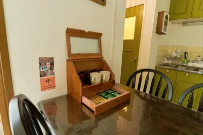 a kitchen with a table with a box on it at shinjuku kabukicho 601 in Tokyo