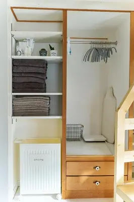 a room with a closet with a desk at shinjuku kabukicho 601 in Tokyo