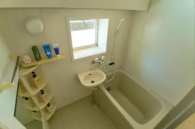 a bathroom with a sink and a bath tub at shinjuku kabukicho 601 in Tokyo