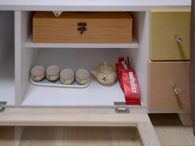a cupboard with bowls and other items in it at City Pal Sakurashinmachi - Vacation STAY 17753 in Tokyo