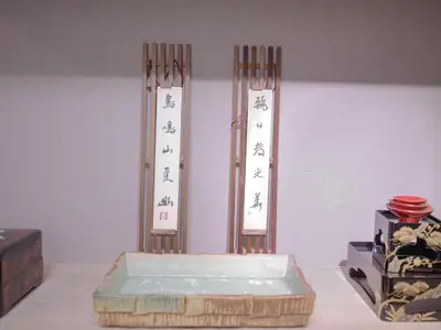 a table with two signs with asian writing on it at City Pal Sakurashinmachi - Vacation STAY 17753 in Tokyo