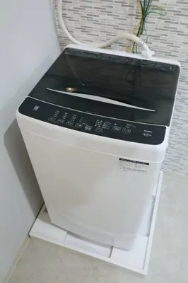 a black and white printer sitting on a counter at Hotel TORAKEN in Tokyo