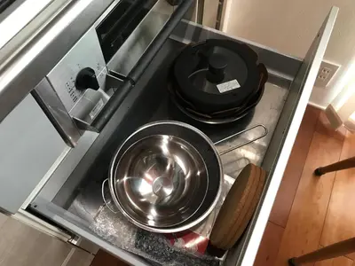 an open stove with a pot and pans in it at Honancho Entire house for rent \u6771\u4eac in Tokyo
