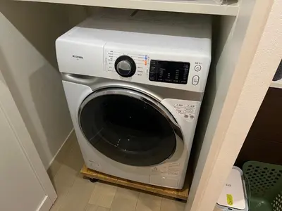 a washer and dryer in a small room at Honancho Entire house for rent \u6771\u4eac in Tokyo