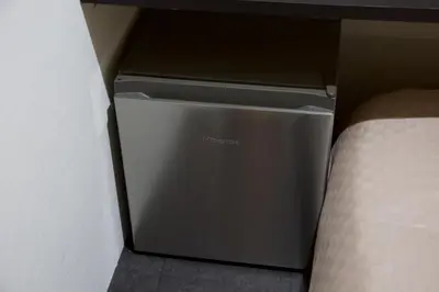 a gray cpu in a box next to a bed at Aikoku Building 5th floor - Vacation STAY 86252v in Tokyo