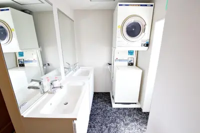a bathroom with a washing machine and a sink at Aikoku Building 5th floor - Vacation STAY 86252v in Tokyo