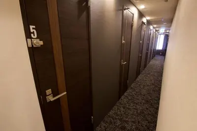 a row of lockers in a hallway with the number five at Aikoku Building 5th floor - Vacation STAY 86252v in Tokyo