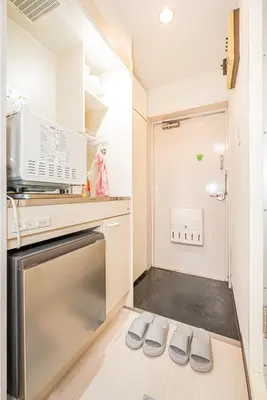a kitchen with a stove and a dishwasher at \u65b0\u5bbf\u533a\u65b0\u5927\u4e45\u4fdd\u7ad93\u5206\u949f\u7d27\u90bb\u97e9\u56fd\u8857#3 in Tokyo