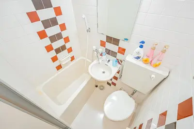 a small bathroom with a toilet and a sink at \u65b0\u5bbf\u533a\u65b0\u5927\u4e45\u4fdd\u7ad93\u5206\u949f\u7d27\u90bb\u97e9\u56fd\u8857#3 in Tokyo