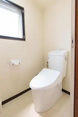 a white toilet in a bathroom with a window at \u9759\u5fc3\u5bbf Tranquil Retreat 2F in Tokyo