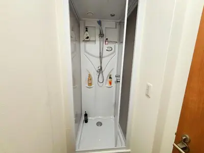 a bathroom with a shower with a shower at \u82b1\u4e43\u90f7 \u7530\u7aefab in Tokyo