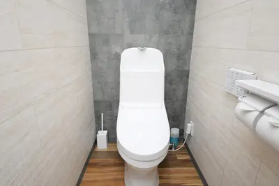 a bathroom with a white toilet in a room at Shinjuku NY House 301 in Tokyo