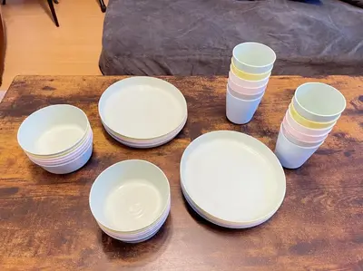 a group of white plates and cups on a table at Comptoir Shinjuku 411 - Vacation STAY 17791 in Tokyo