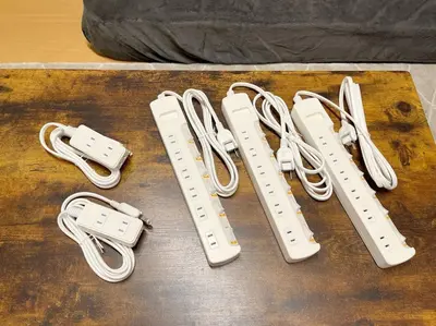 a group of nintendo wii controllers sitting on a table at Comptoir Shinjuku 411 - Vacation STAY 17791 in Tokyo