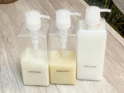 three bottles of soap sitting on top of a table at Fujiwa Excel Dogenzaka 602 - Vacation STAY 17792 in Tokyo