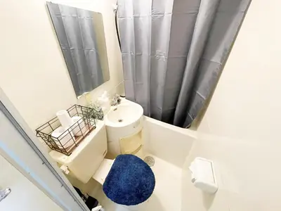 a small bathroom with a toilet and a mirror at Fujiwa Excel Dogenzaka 602 - Vacation STAY 17792 in Tokyo