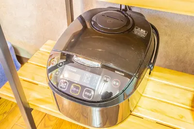 a iron sitting on top of a wooden table at Fujiwa Excel Dogenzaka 602 - Vacation STAY 17792 in Tokyo