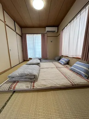 a large bed in a room with two pillows at scented tea - Vacation STAY 21610v in Tokyo