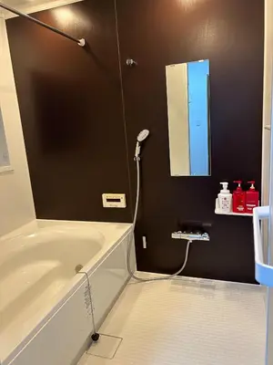 a bathroom with a bath tub and a mirror at scented tea - Vacation STAY 21610v in Tokyo