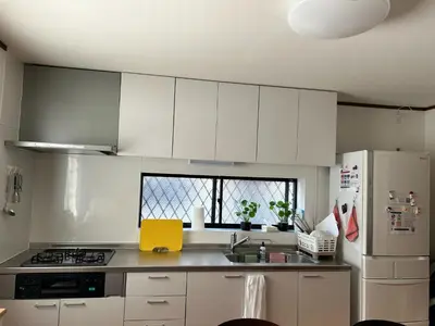 a kitchen with white cabinets and a white refrigerator at scented tea - Vacation STAY 21610v in Tokyo